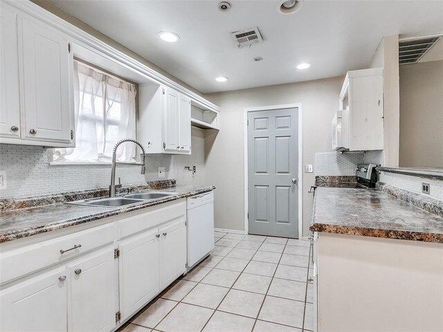 1040 Mabel C Fry Blvd, Yukon, OK 73099 - kitchen featuring white appliances, white cabinets, decorative backsplash, light tile patterned floors, and recessed lighting