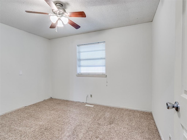 1040 Mabel C Fry Blvd, Yukon, OK 73099 - empty room featuring carpet, ceiling fan, and a textured ceiling