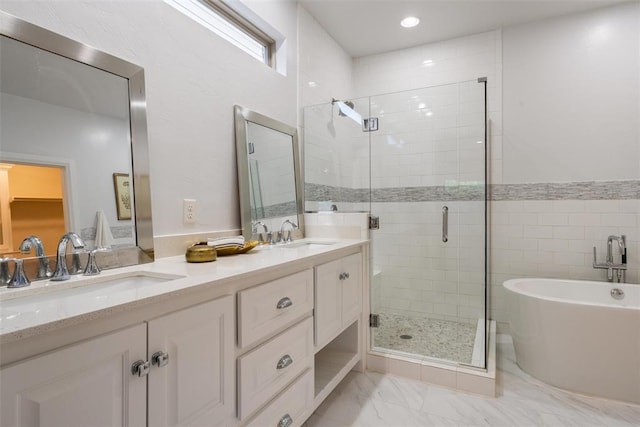 1517 Station St, Edmond, OK 73034 - full bath featuring a shower stall, double vanity, a soaking tub, and marble finish floors