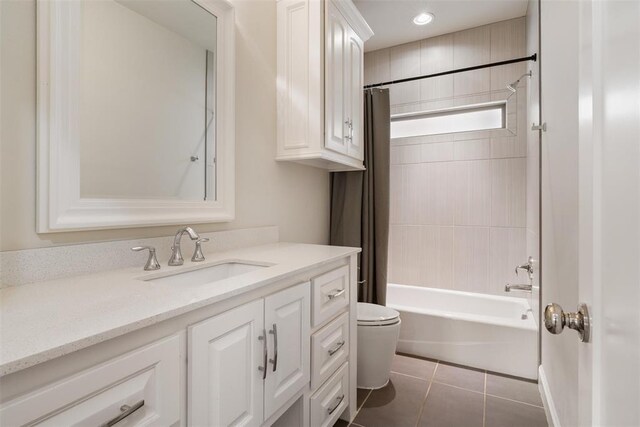1517 Station St, Edmond, OK 73034 - bathroom featuring vanity, shower / bath combination with curtain, tile patterned flooring, and recessed lighting