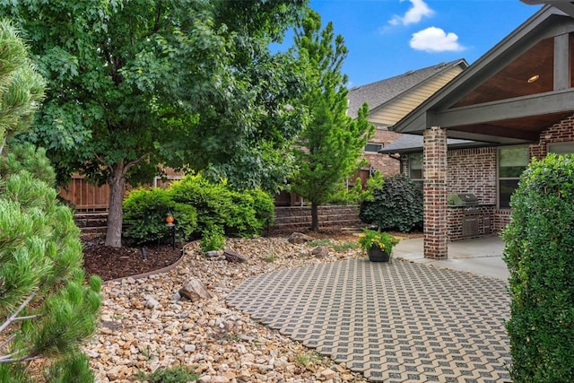 1517 Station St, Edmond, OK 73034 - view of yard with a patio area