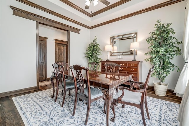 15936 SW 12th St, Yukon, OK 73099 - dining area with ceiling fan, wood finished floors, ornamental molding, and a raised ceiling
