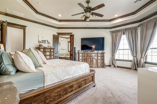 15936 SW 12th St, Yukon, OK 73099 - bedroom featuring a raised ceiling, crown molding, carpet, ensuite bathroom, and a ceiling fan