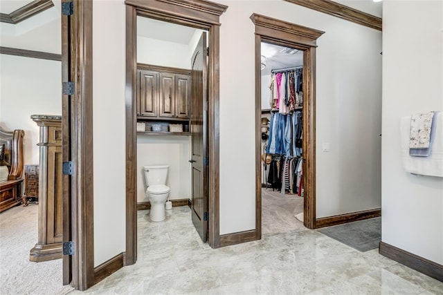15936 SW 12th St, Yukon, OK 73099 - bathroom with ornamental molding and a spacious closet