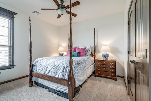 15936 SW 12th St, Yukon, OK 73099 - bedroom featuring carpet, multiple windows, and ceiling fan