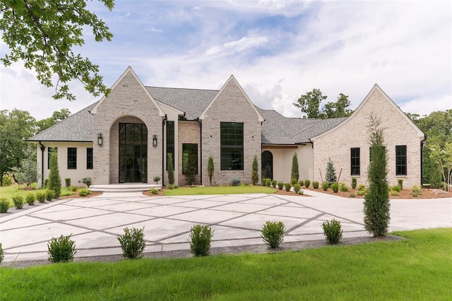 3005 Bee Hive Way, Jones, OK 73049 - view of front of house with brick siding and a front lawn