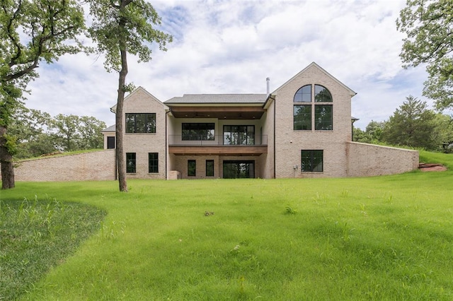 3005 Bee Hive Way, Jones, OK 73049 - rear view of house featuring a balcony, a yard, and stucco siding