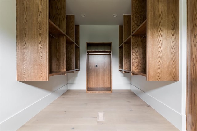3005 Bee Hive Way, Jones, OK 73049 - spacious closet with wood finished floors