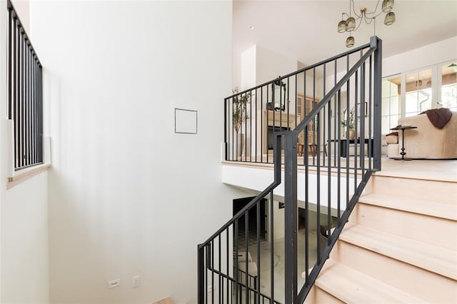 3005 Bee Hive Way, Jones, OK 73049 - staircase featuring a towering ceiling