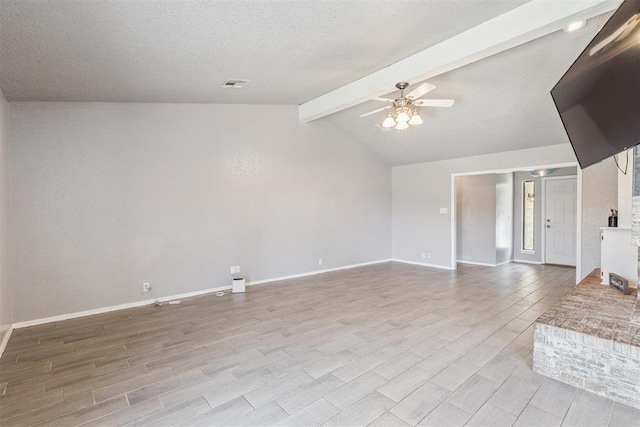 1909 Magnolia Ln, Edmond, OK 73013 - unfurnished living room with ceiling fan and wood finished floors