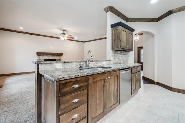 413 Branch Line Rd, Yukon, OK 73099 - kitchen featuring dishwasher, ceiling fan, crown molding, light stone countertops, and tasteful backsplash