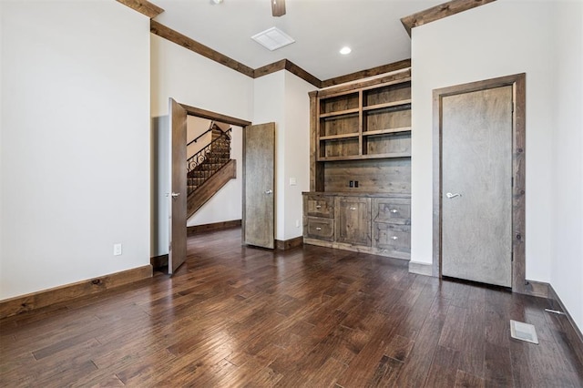 413 Branch Line Rd, Yukon, OK 73099 - unfurnished bedroom with dark wood-style floors and a ceiling fan