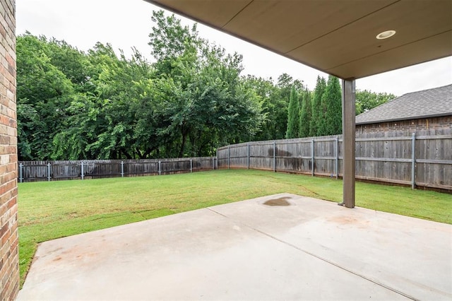 413 Branch Line Rd, Yukon, OK 73099 - fenced backyard with a patio area