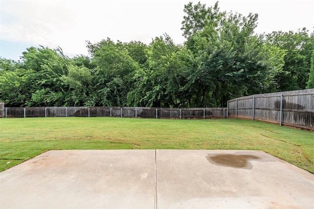 413 Branch Line Rd, Yukon, OK 73099 - fenced backyard with a patio area