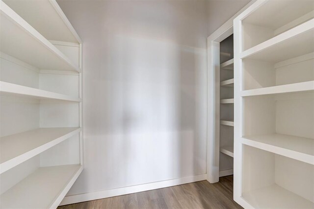 4337 Pinon Ln, Piedmont, OK 73078 - walk in closet with wood finished floors