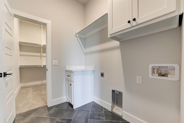 4337 Pinon Ln, Piedmont, OK 73078 - washroom with hookup for an electric dryer, cabinet space, washer hookup, and dark tile patterned flooring