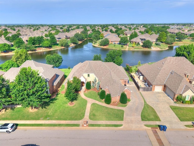 13705 Cascata Strada St, Oklahoma City, OK 73170 - aerial perspective of suburban area featuring a nearby body of water