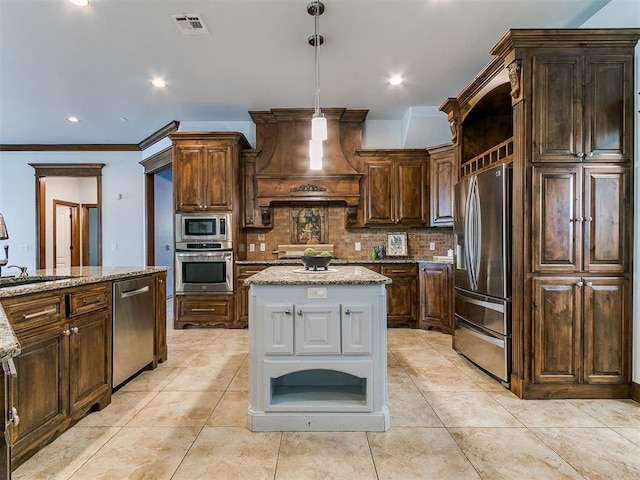 13705 Cascata Strada St, Oklahoma City, OK 73170 - kitchen featuring stainless steel appliances, custom exhaust hood, tasteful backsplash, light stone countertops, and recessed lighting