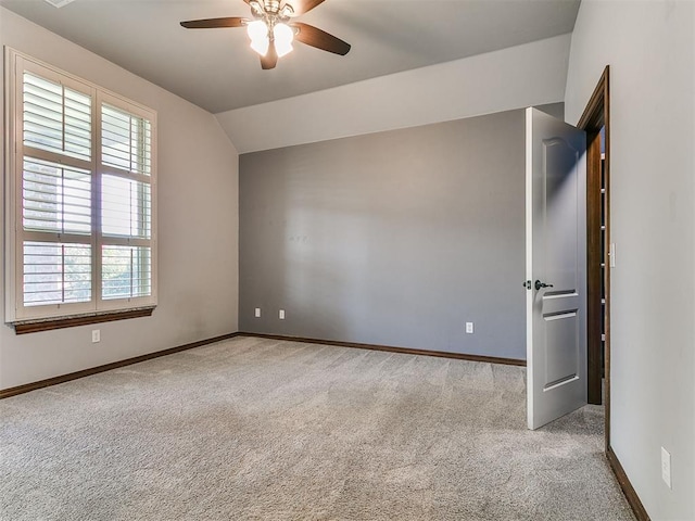 13705 Cascata Strada St, Oklahoma City, OK 73170 - carpeted empty room featuring ceiling fan and vaulted ceiling