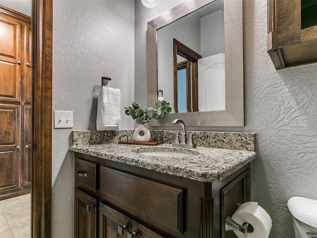 13705 Cascata Strada St, Oklahoma City, OK 73170 - half bathroom featuring vanity and a textured wall