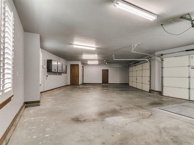 13705 Cascata Strada St, Oklahoma City, OK 73170 - garage with baseboards
