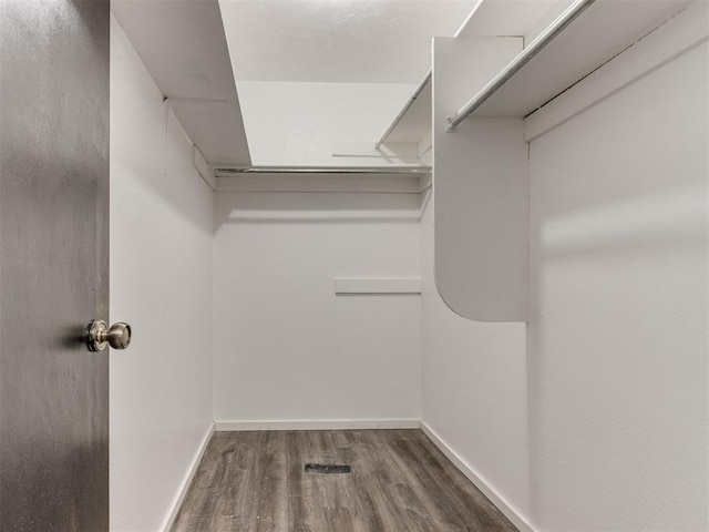 704 NW 137th St, Edmond, OK 73013 - walk in closet with wood finished floors