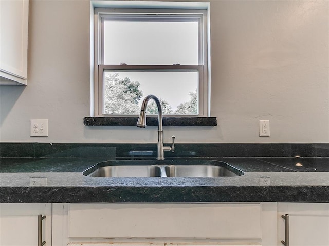2248 NW 22nd St, Oklahoma City, OK 73107 - kitchen with white cabinetry and dark stone countertops