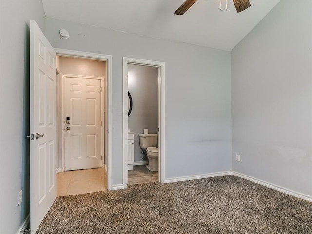 2248 NW 22nd St, Oklahoma City, OK 73107 - unfurnished bedroom featuring carpet floors, connected bathroom, and a ceiling fan