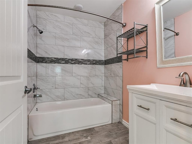 2248 NW 22nd St, Oklahoma City, OK 73107 - full bath featuring bathtub / shower combination, vanity, and wood finished floors