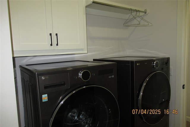 15901 Sarno Ln, Edmond, OK 73013 - laundry area with washing machine and clothes dryer and cabinet space