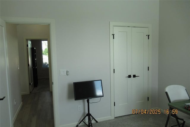 15901 Sarno Ln, Edmond, OK 73013 - office area with baseboards and wood finished floors