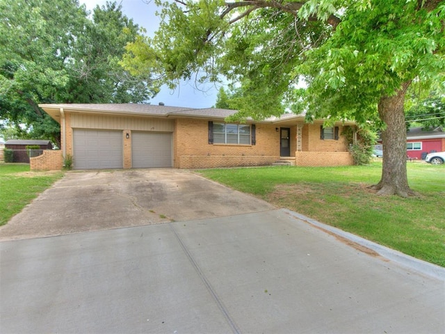 119 Thompson Dr, Moore, OK 73160 - ranch-style house with brick siding, an attached garage, a front lawn, and concrete driveway