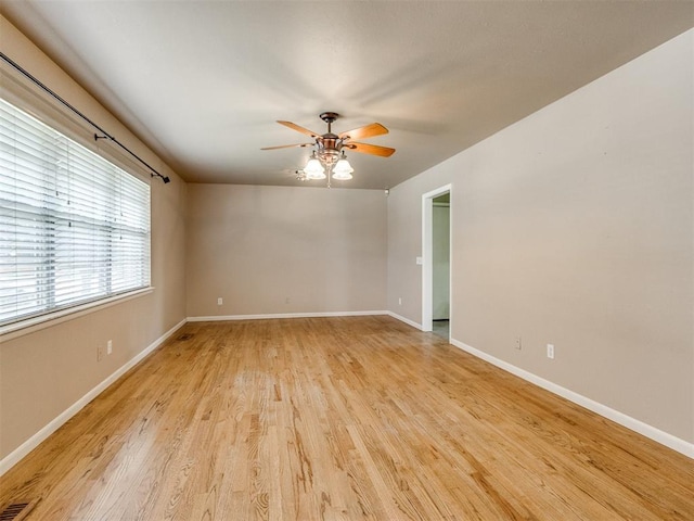 119 Thompson Dr, Moore, OK 73160 - empty room featuring a ceiling fan and light wood-style flooring