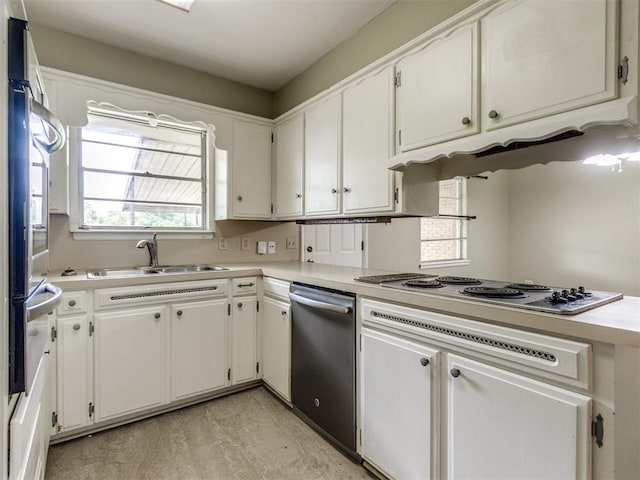 119 Thompson Dr, Moore, OK 73160 - kitchen with stainless steel appliances, light countertops, and white cabinetry