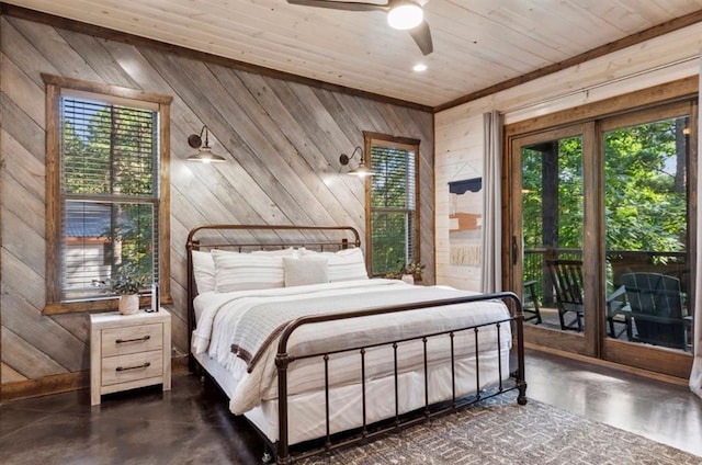 2105 Pine Hills Rd, Broken Bow, OK 74728 - bedroom with wooden walls, multiple windows, access to outside, and wood ceiling