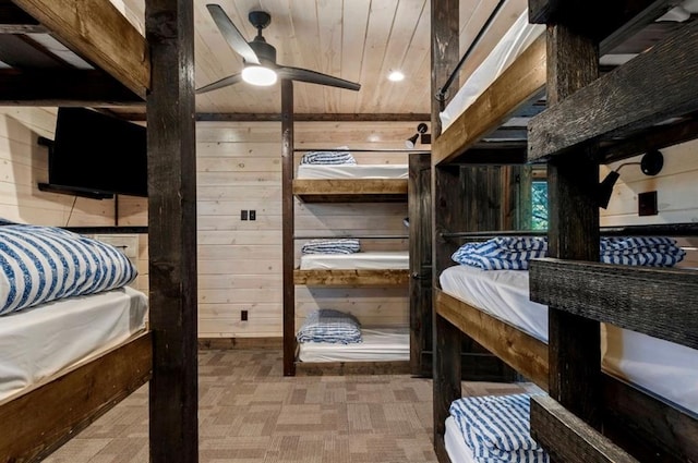 2105 Pine Hills Rd, Broken Bow, OK 74728 - bedroom with wooden walls and wooden ceiling