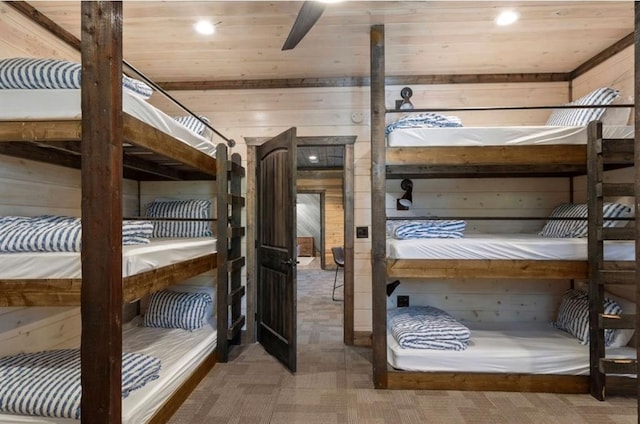 2105 Pine Hills Rd, Broken Bow, OK 74728 - unfurnished bedroom featuring wooden walls, recessed lighting, wood ceiling, and carpet