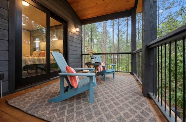 2105 Pine Hills Rd, Broken Bow, OK 74728 - sunroom / solarium featuring lofted ceiling