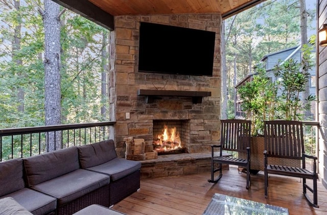 2105 Pine Hills Rd, Broken Bow, OK 74728 - deck featuring an outdoor living space with a fireplace