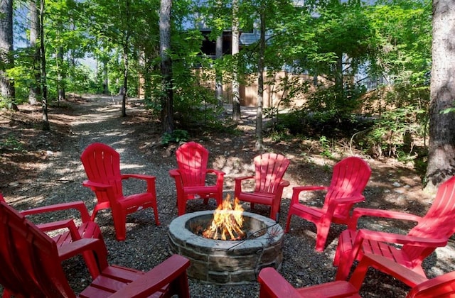 2105 Pine Hills Rd, Broken Bow, OK 74728 - view of patio / terrace featuring a fire pit
