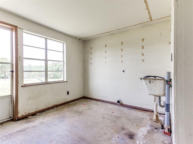 3240 SW 119th St, Oklahoma City, OK 73170 - empty room featuring concrete floors