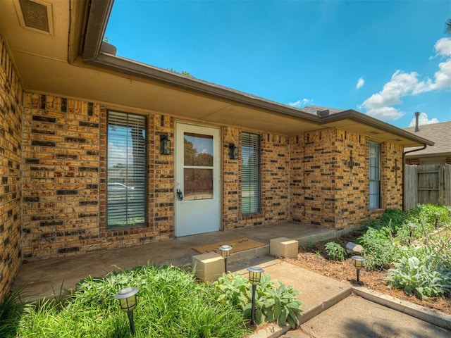 4812 Hunton Ter, Yukon, OK 73099 - property entrance with brick siding