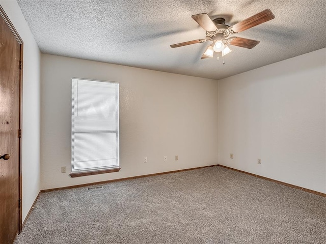 4812 Hunton Ter, Yukon, OK 73099 - empty room featuring carpet, ceiling fan, and a textured ceiling