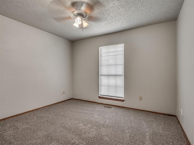 4812 Hunton Ter, Yukon, OK 73099 - unfurnished room featuring carpet, a ceiling fan, and a textured ceiling