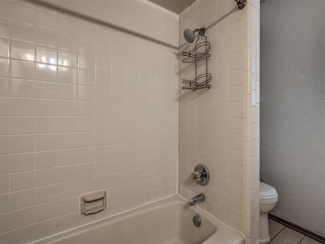 4812 Hunton Ter, Yukon, OK 73099 - full bath featuring shower / tub combination, a textured wall, and tile patterned flooring