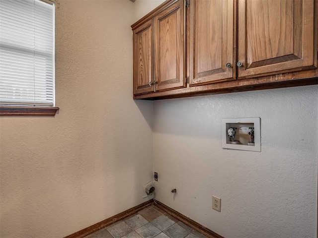 4812 Hunton Ter, Yukon, OK 73099 - laundry room featuring cabinet space, hookup for an electric dryer, hookup for a washing machine, and gas dryer hookup