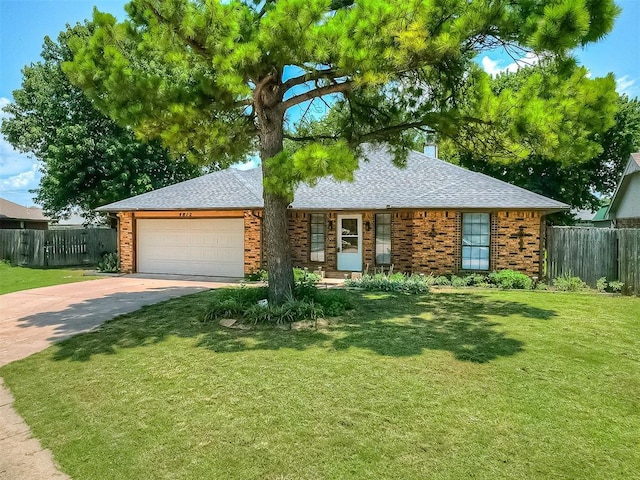 4812 Hunton Ter, Yukon, OK 73099 - view of front of property with concrete driveway, an attached garage, brick siding, and roof with shingles