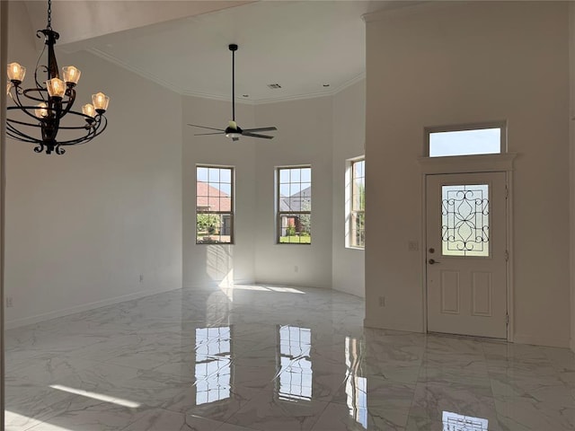 1016 Erinova Dr, Yukon, OK 73099 - entryway featuring light marble finish floors, a chandelier, ornamental molding, a high ceiling, and ceiling fan