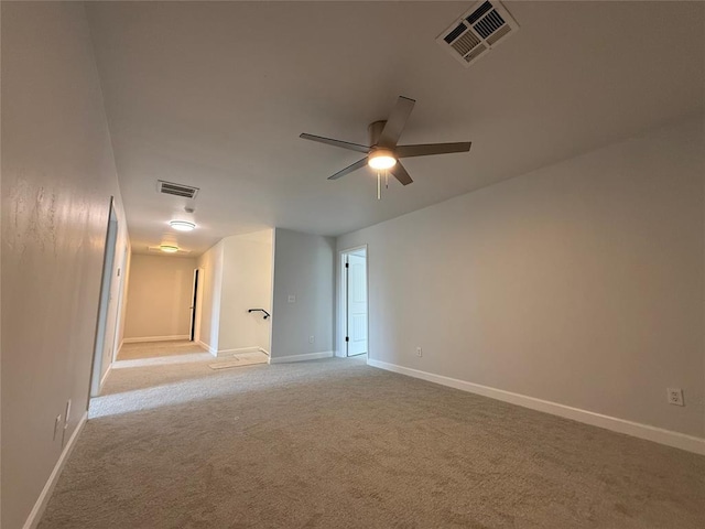 1016 Erinova Dr, Yukon, OK 73099 - empty room with a ceiling fan and light colored carpet