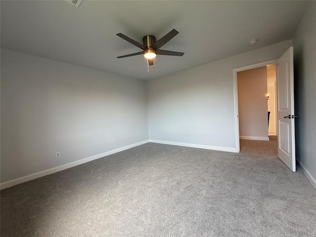 1016 Erinova Dr, Yukon, OK 73099 - spare room with ceiling fan, a smoke detector, and carpet flooring